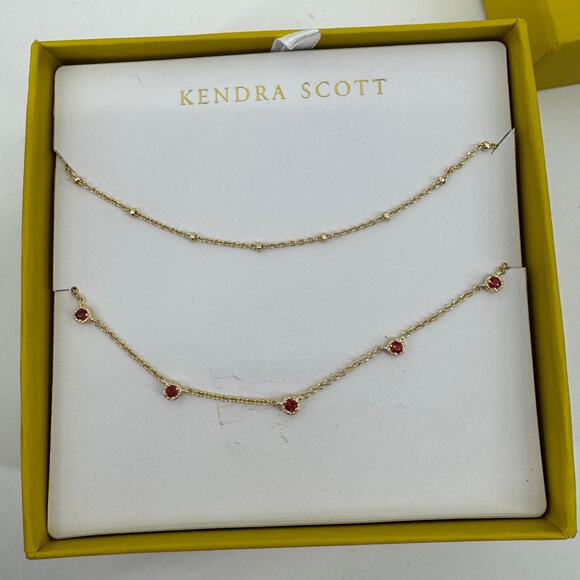 Kendra Scott Present Pendant Necklace Gold Red Crystal  Kendra Scott Gold Tone Layered Necklace Set Red Crystal Stations Boxed